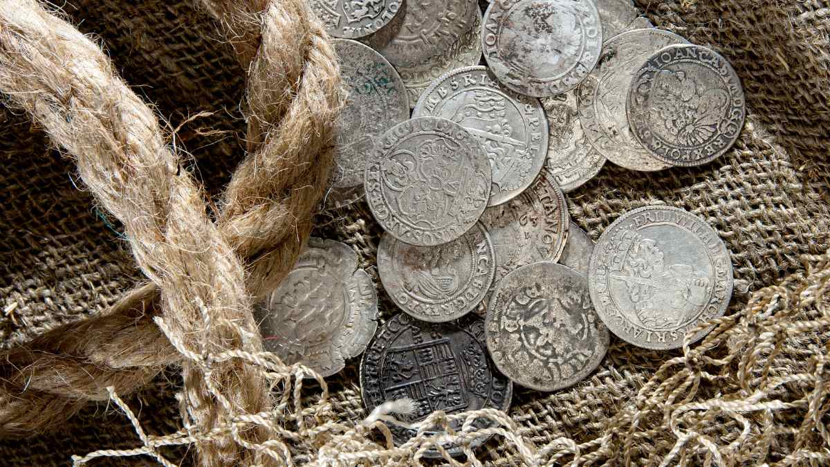 A builder finds a historic treasure trove of medieval coins more than 700 years old.