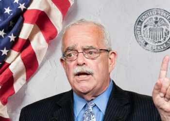 Portrait of a blue-collar federal employee with an American flag backdrop, representing proposed pay boosts under new adjustment plan.