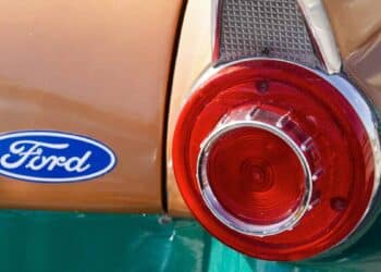 Close-up of a Ford vehicle taillight with the Ford logo. Related to the recall of 272,817 vehicles due to a battery fault in the US