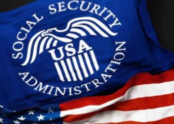 ocial Security Administration USA logo on a blue flag with the American flag in the background. Process to apply for a Social Security Number in the United States