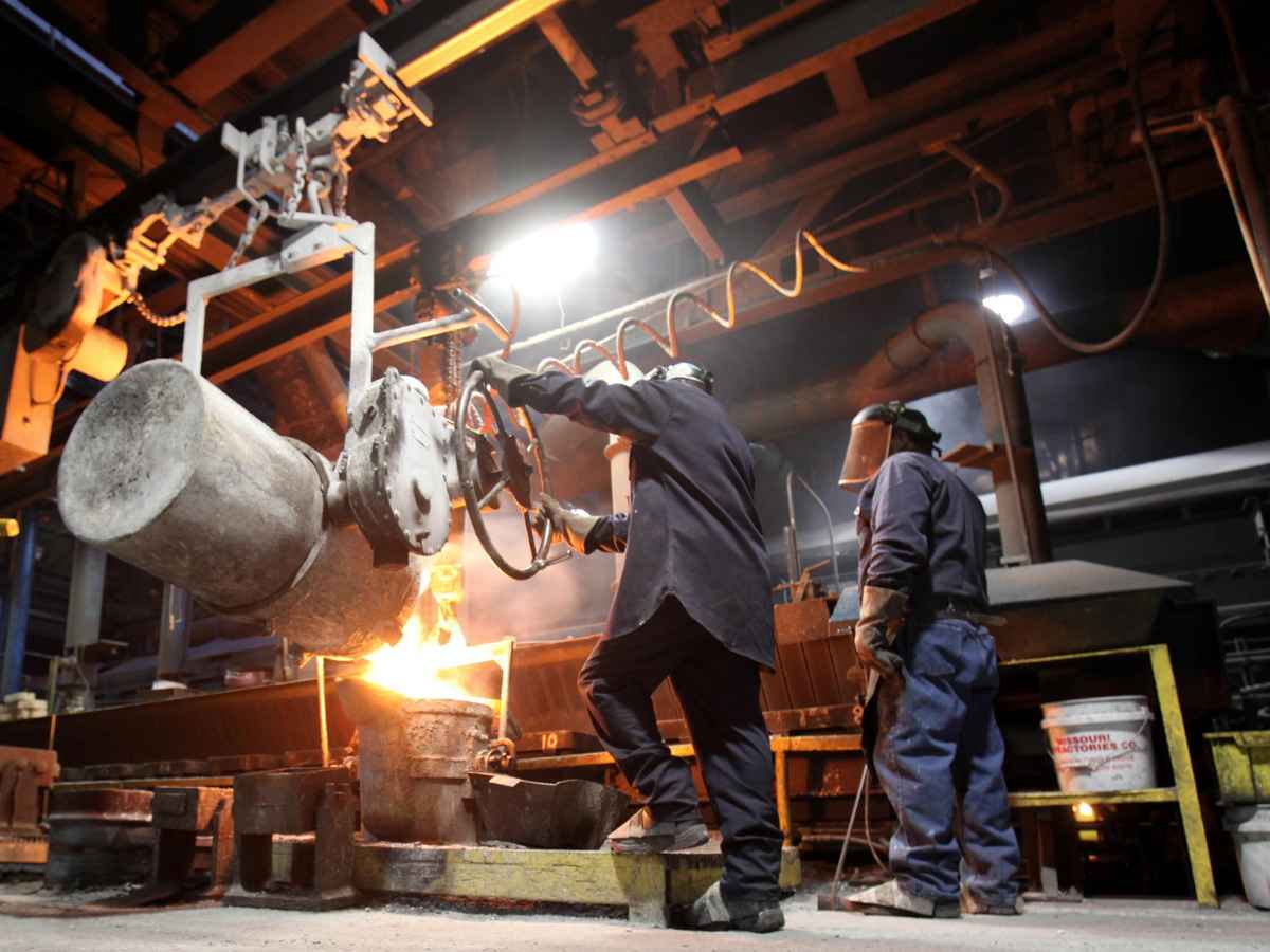 Workers at Grede’s Brewton, Alabama iron-casting plant pour molten metal shortly before the facility’s planned closure and 200 layoffs