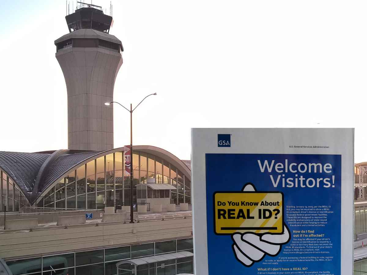 Missouri airport control tower with REAL ID informational sign reminding travelers of the May 7 enforcement deadline