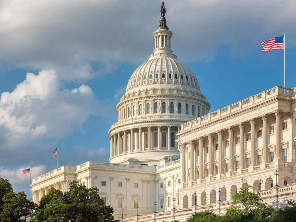 U.S. Capitol dome and American flag, representing the federal decision to raise SSI payments through the latest Social Security update