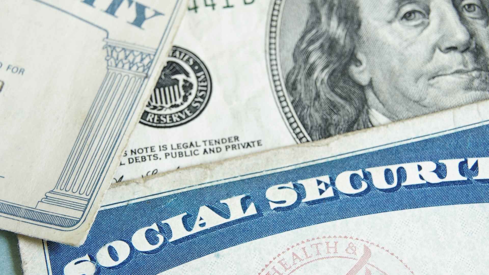 Social Security statement next to a U.S. $100 bill representing May 2025 benefit payments for retirees
