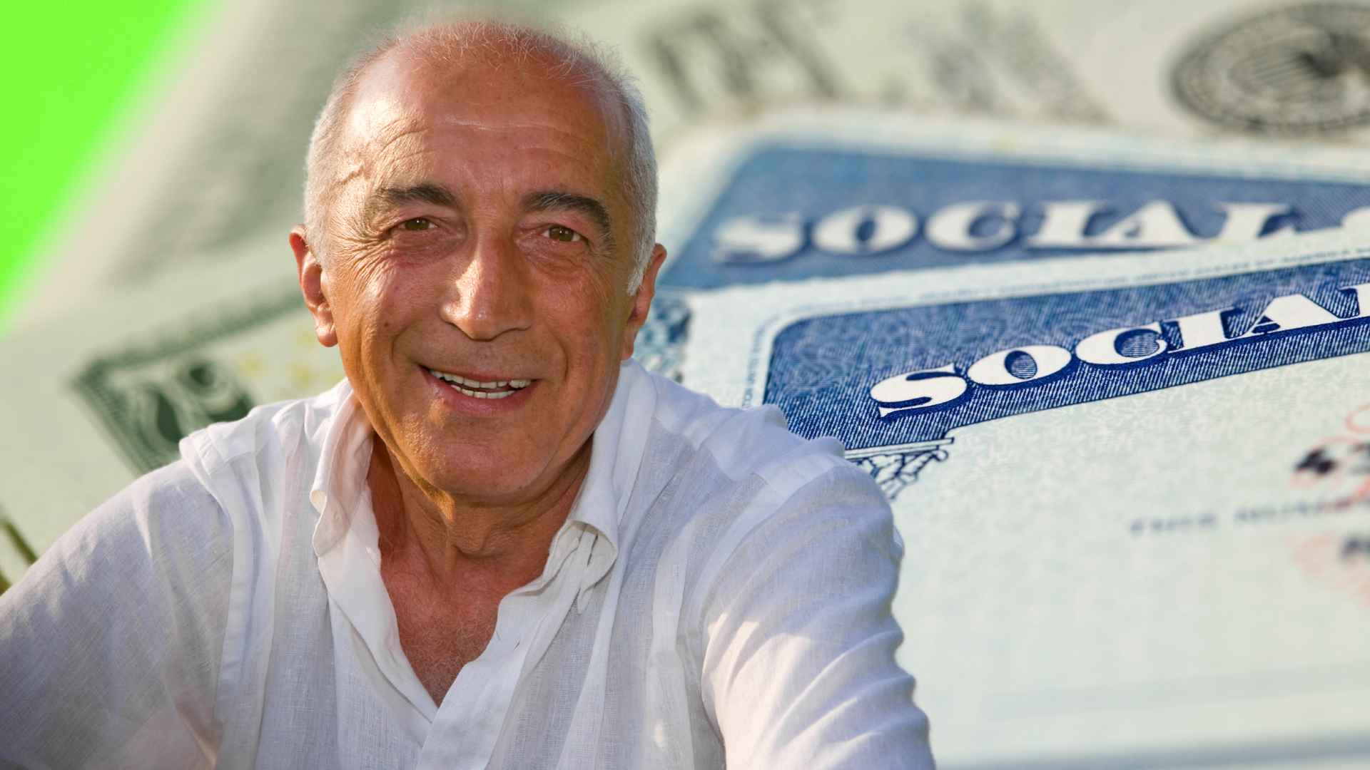 Smiling 69-year-old man with a Social Security card in the background