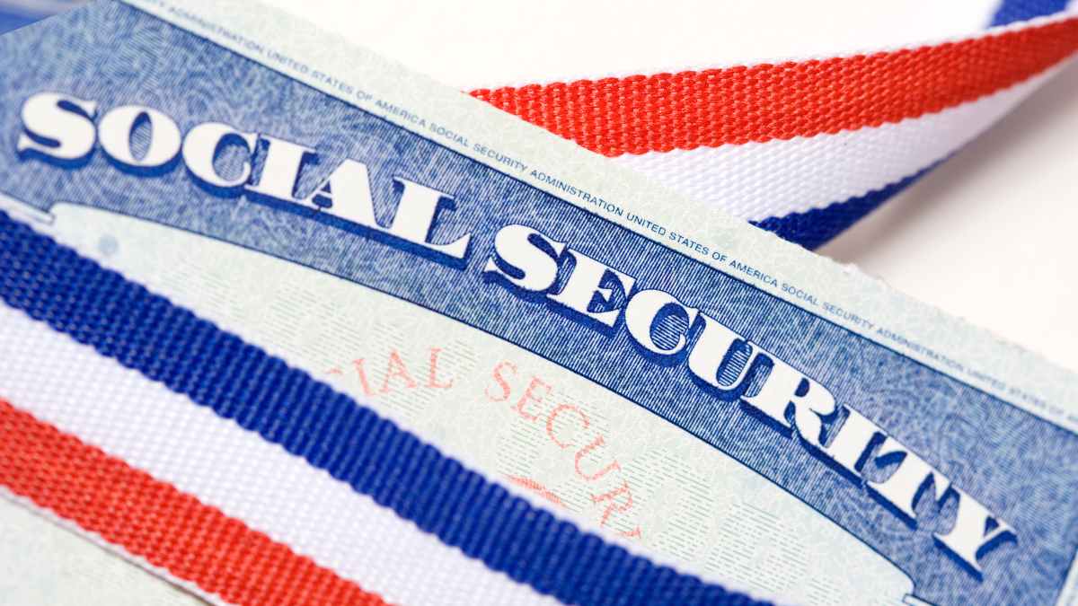 Social Security card with red-white-blue ribbon underscores login.gov requirement for retirees payments