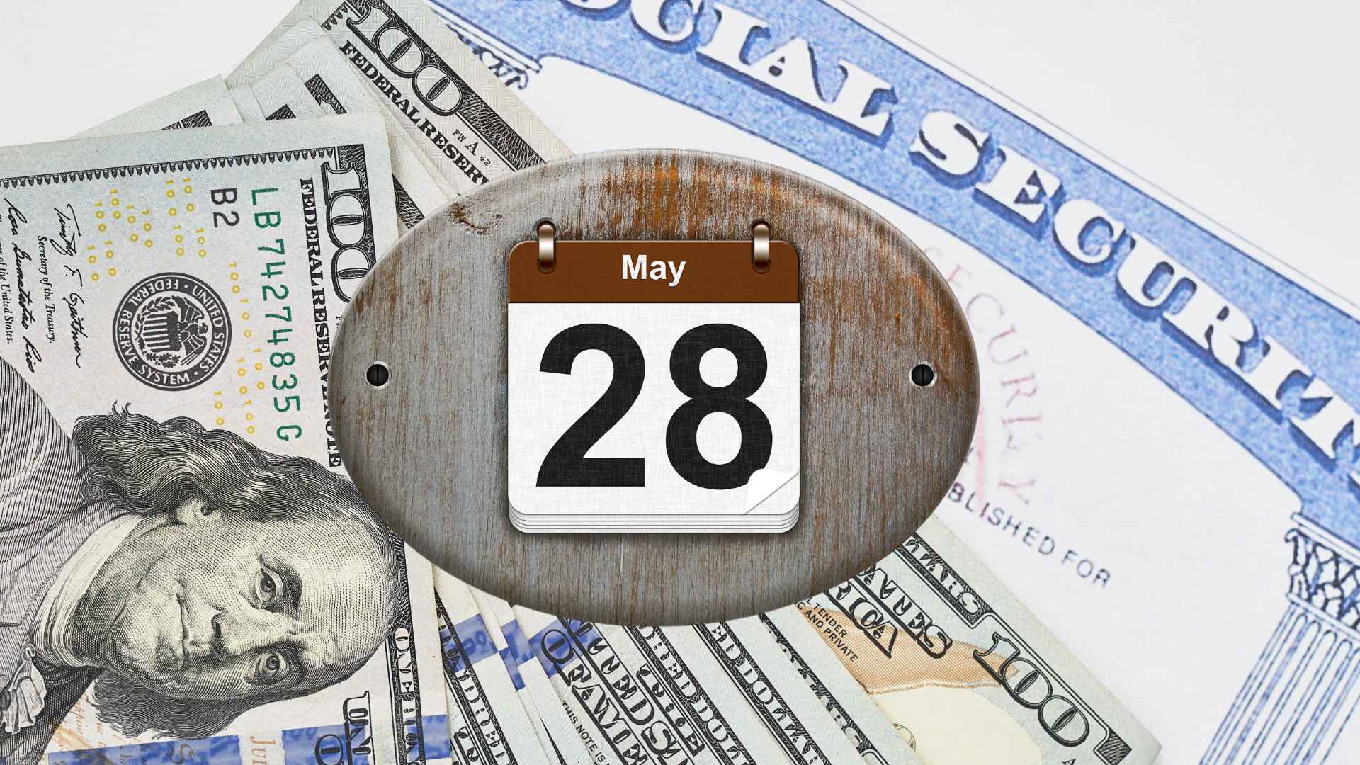 Calendar displaying “May 28” atop a Social Security card and scattered $100 bills, illustrating the upcoming COLA-boosted benefit payment date.