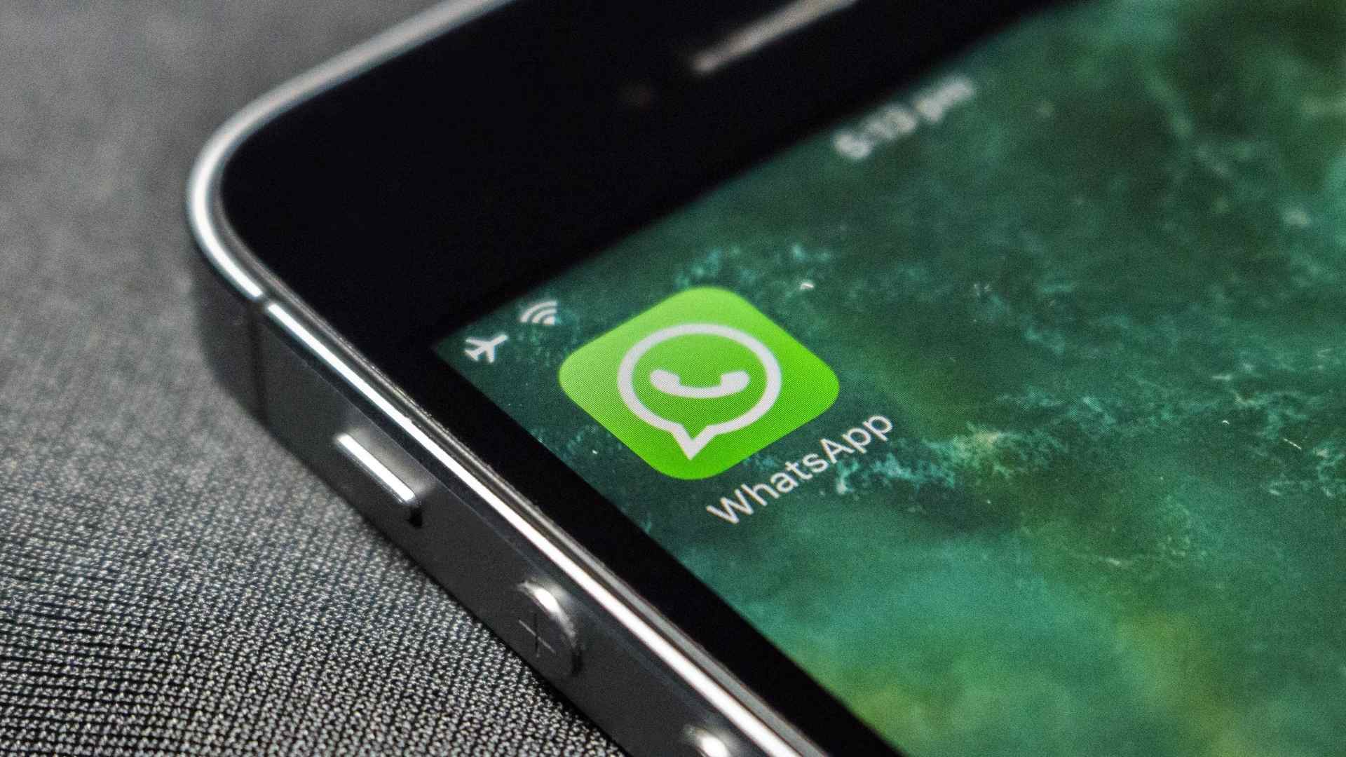 Close-up of WhatsApp icon on smartphone screen ahead of major app-wide update