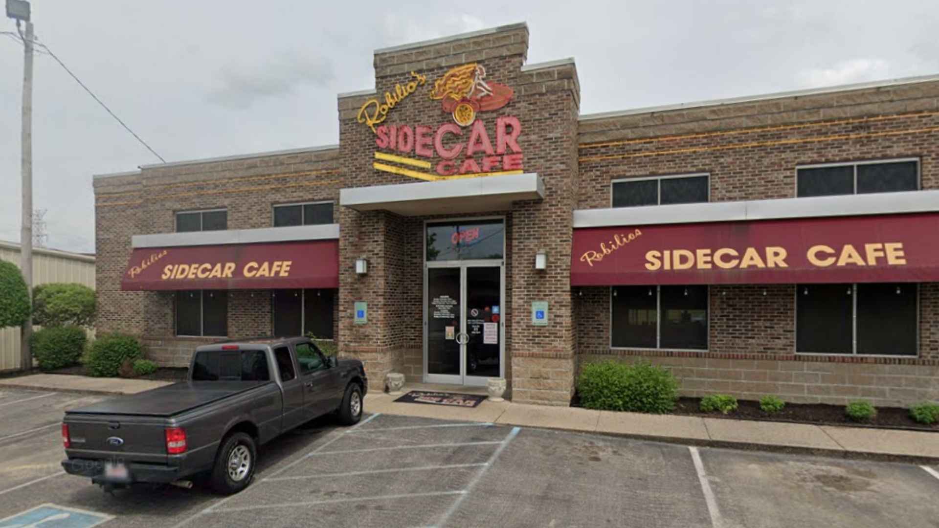 Sidecar Cafe neon sign at legends in memphis before closure in june 2025