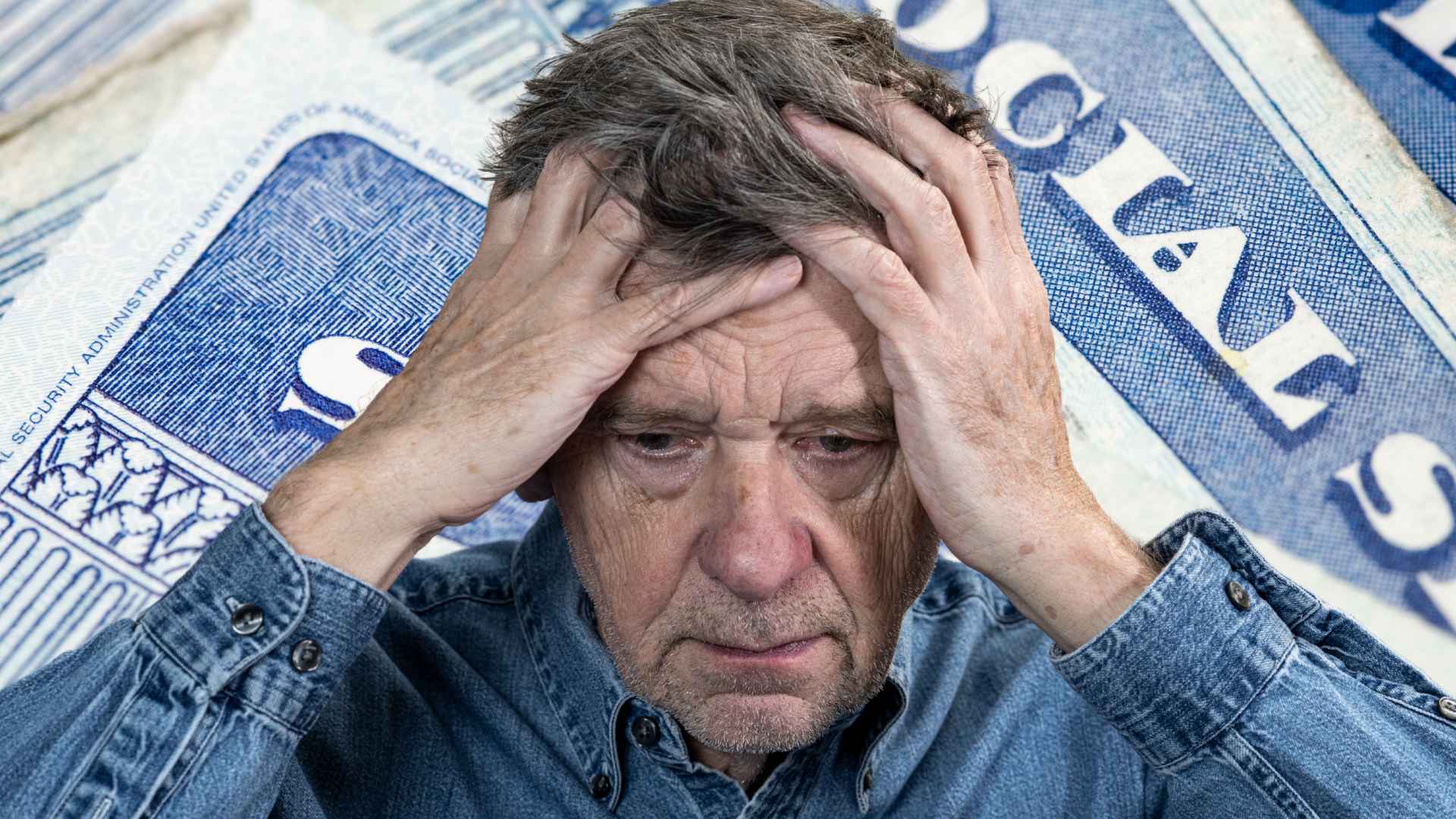 Worried senior man holding head in hands over Social Security payment cut