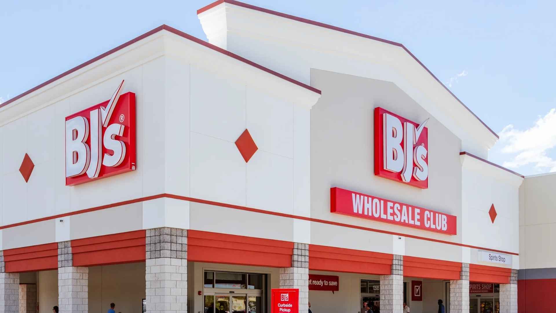 BJ's Wholesale Club storefront with red signage and curbside pickup at Springfield location