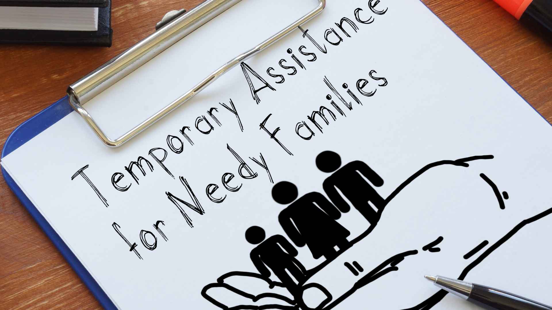 TANF form on a clipboard with a family icon, representing Temporary Assistance for Needy Families cash aid.
