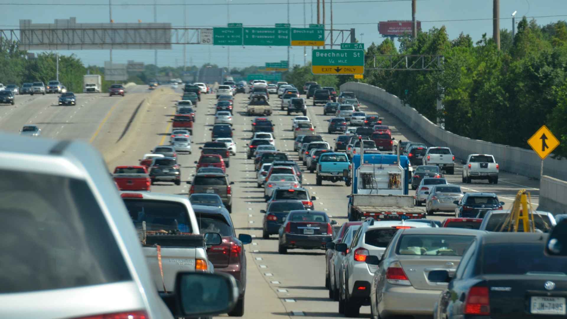 Heavy traffic on a Texas highway as stricter DWI laws impose up to $10,000 in fines and prison