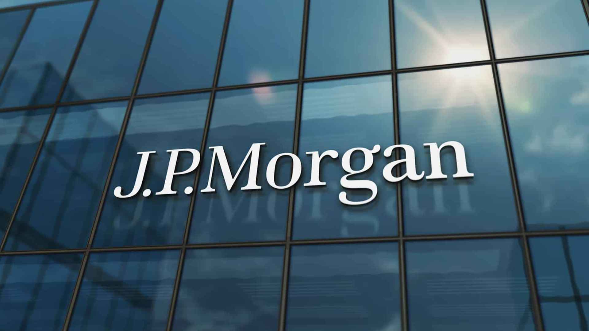 J.P. Morgan building reflecting sunlight, highlighting study on Americans shifting to high-interest savings accounts.