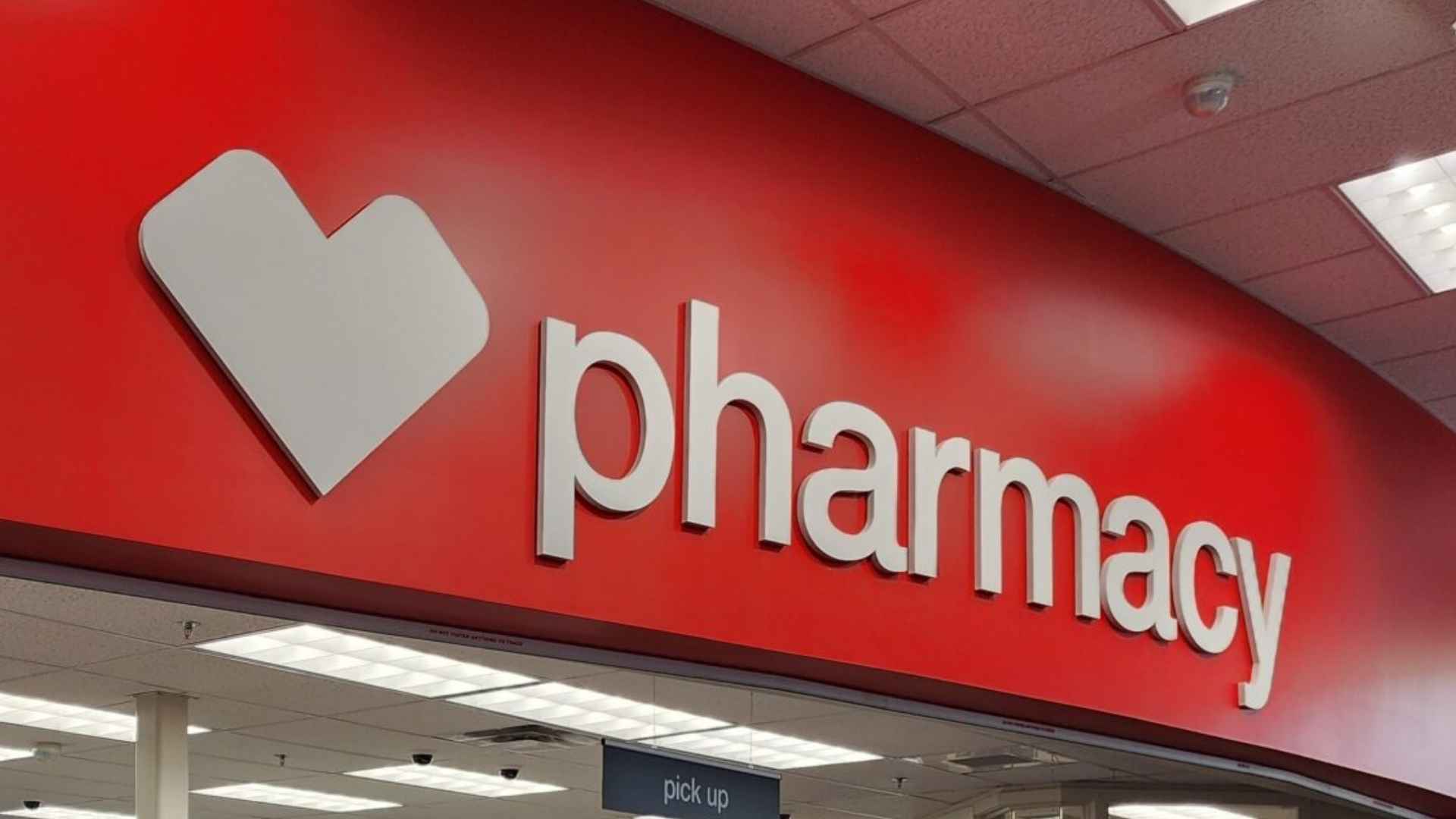 Pharmacy counter interior with signage, representing prescription medications linked to dementia risk in adults aged 35 to 64