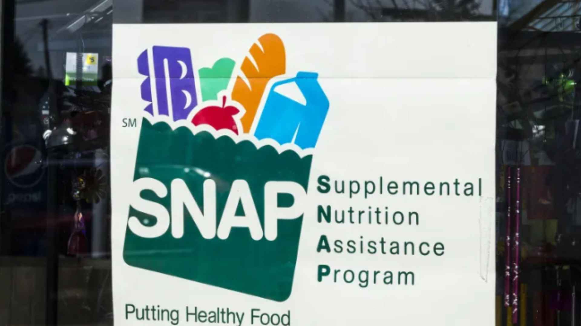 SNAP benefits sign at authorized retailer for Supplemental Nutrition Assistance Program