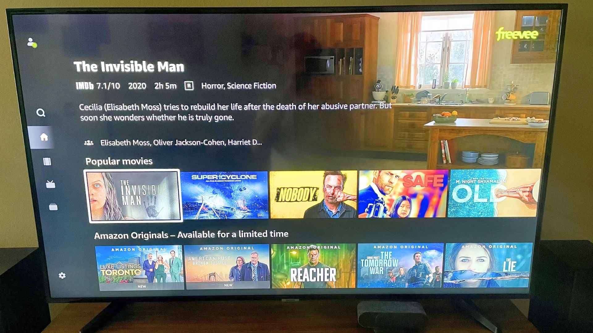 Amazon Freevee interface on a smart TV showing “The Invisible Man,” popular movies, and Amazon Originals before its 2025 shutdown.