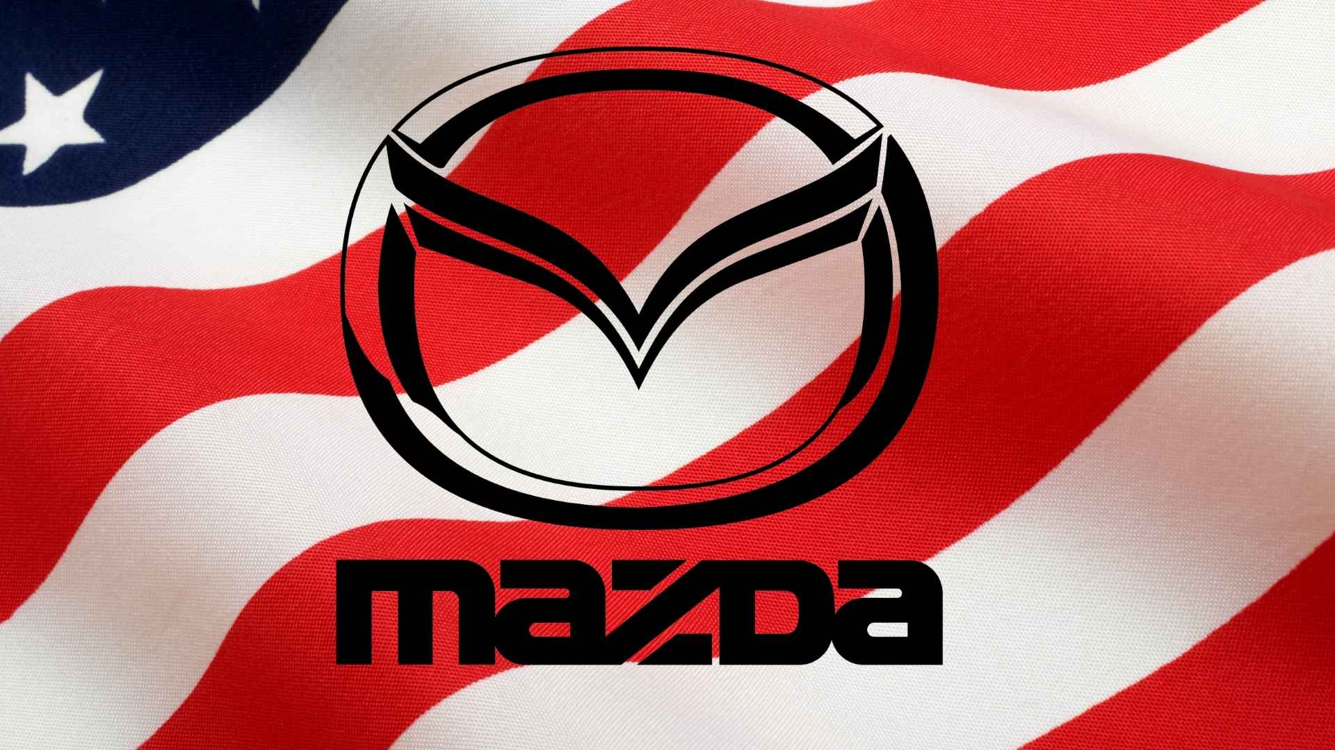 Mazda logo over American flag amid 2025 MX-5 Miata recall for stability control software flaw