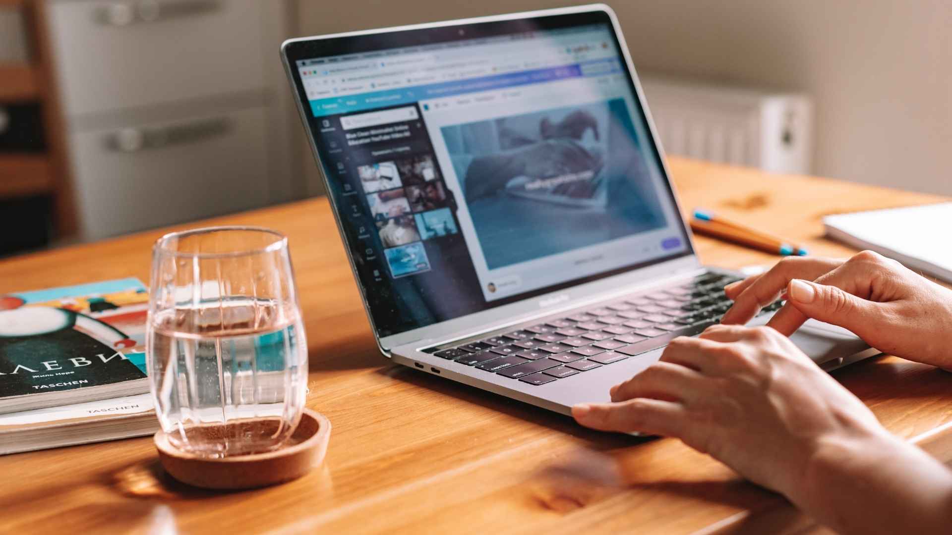Remote employee working from home on a laptop, highlighting flexible work environment