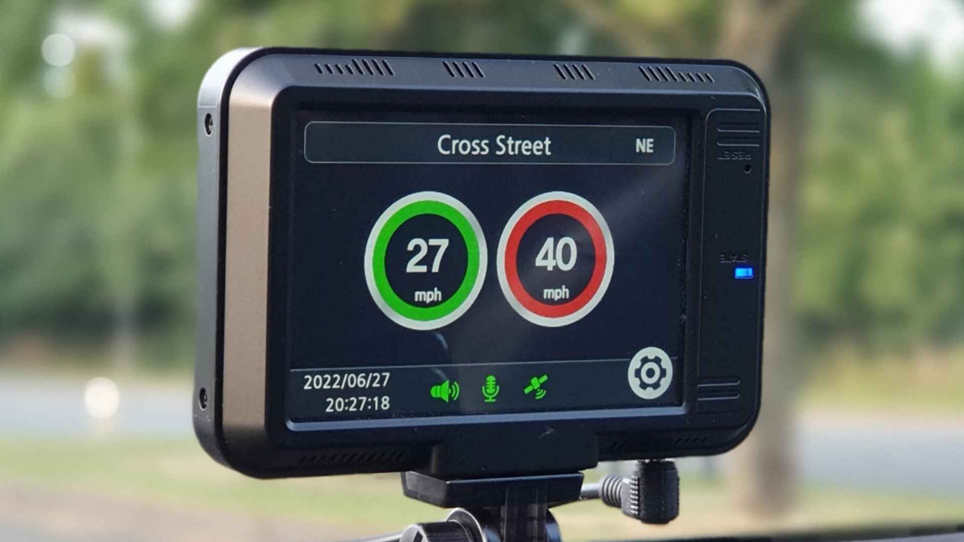 GPS speed limiter device displaying current speed and speed limit installed in a vehicle in Washington state
