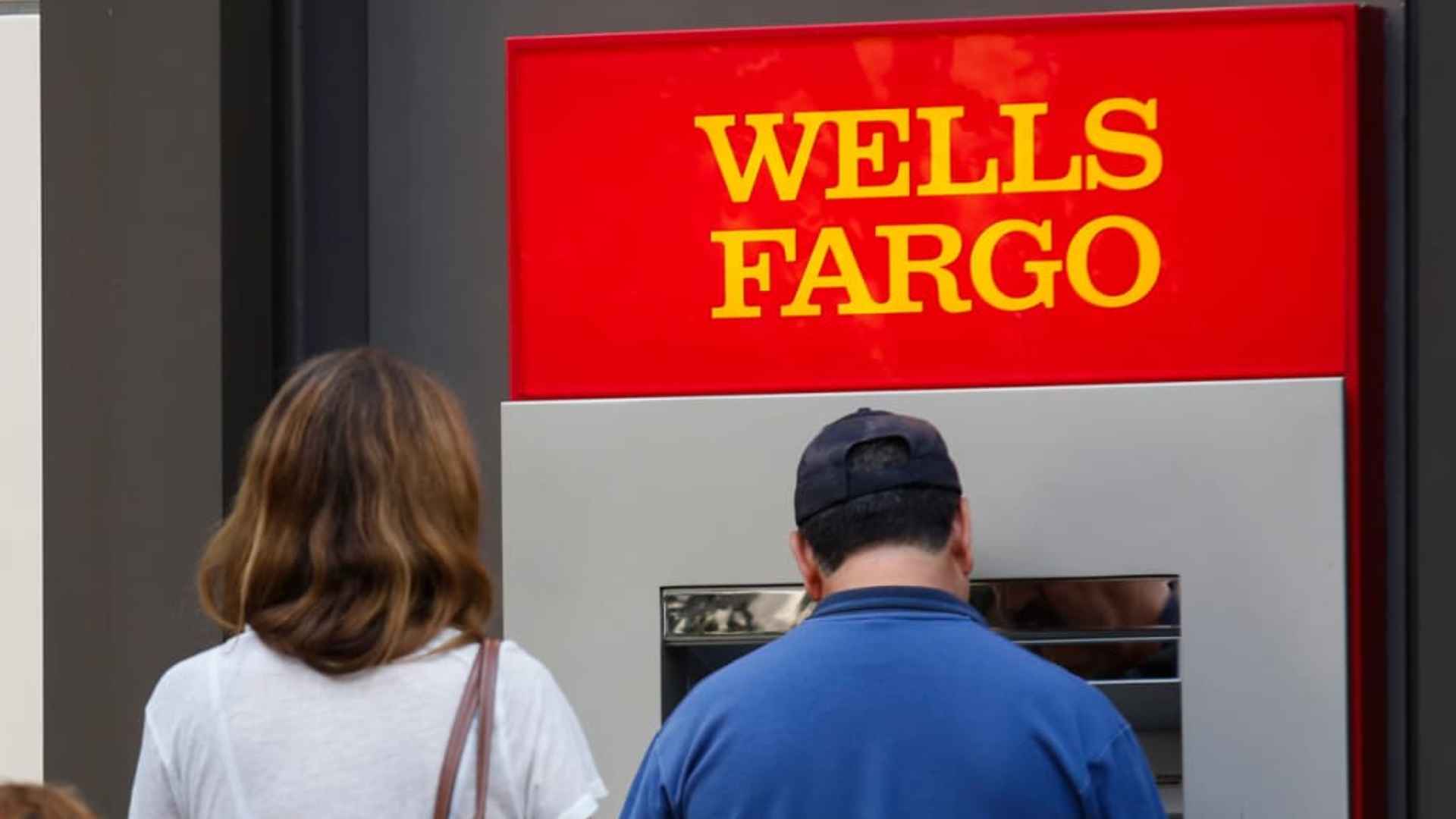 Two Wells Fargo customers using ATM amid inactive account closures in the U.S.