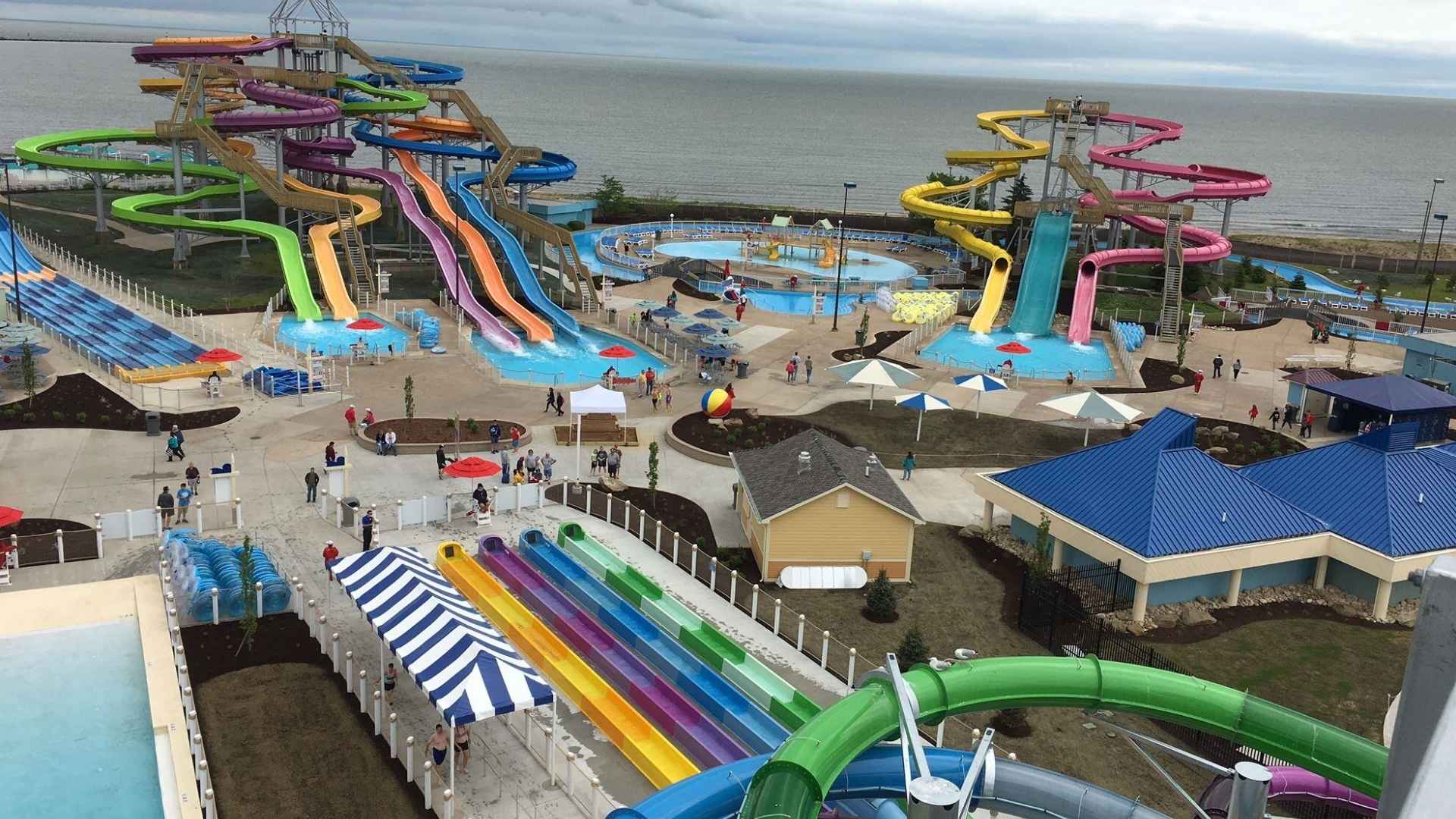 Aerial view of Cedar Point Shores water park showing colorful water slides and pools near Lake Erie.