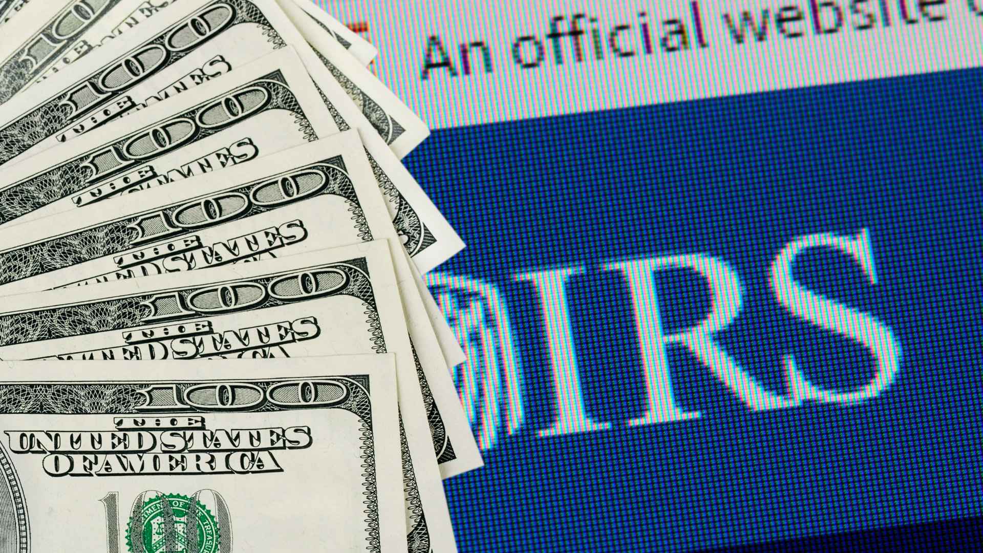 IRS website logo displayed next to hundred-dollar bills, illustrating the end of the free Direct File program and increased taxpayer costs