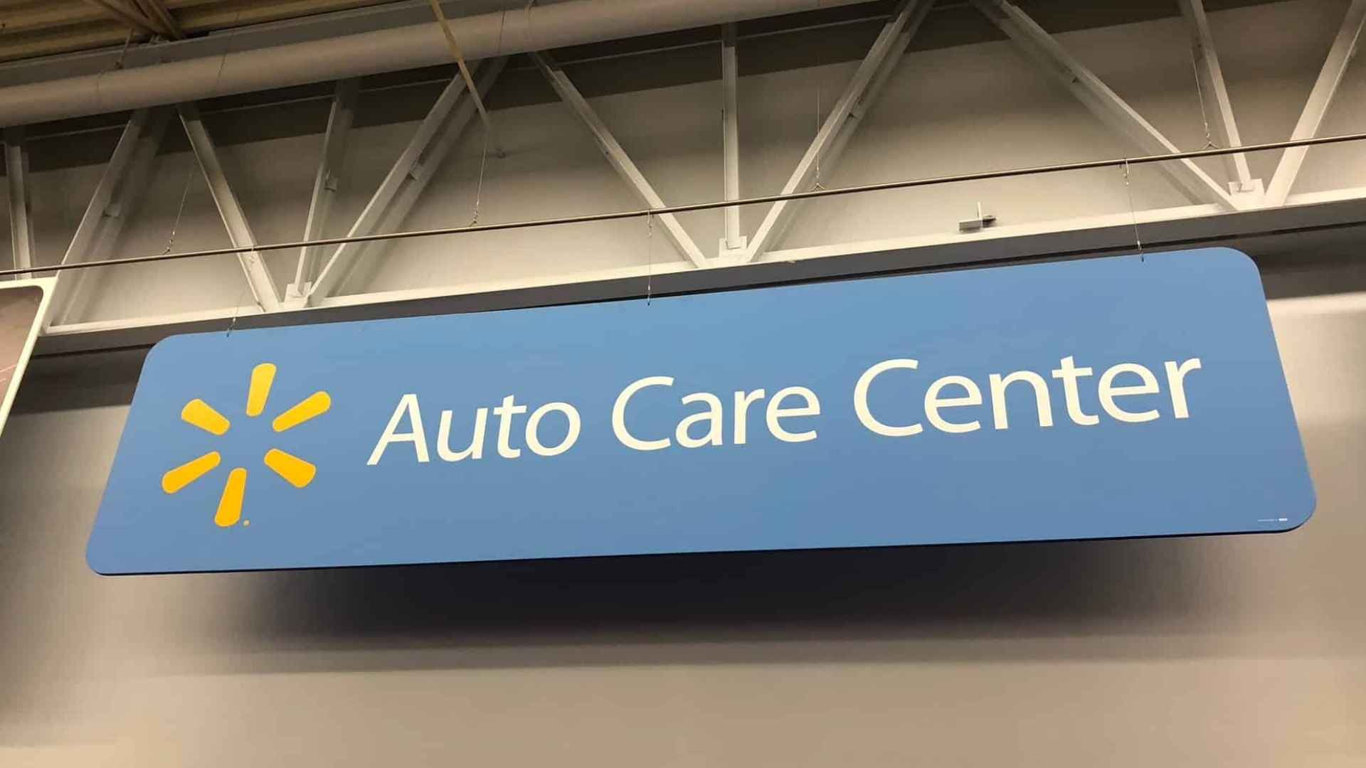 Walmart Auto Care Center sign inside a store where a customer reported issues after an oil change