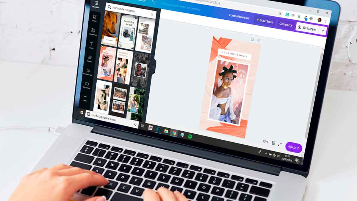 Manos trabajando en portátil con Canva para diseñar un ebook, parte del curso gratuito que potencia tus habilidades de diseño