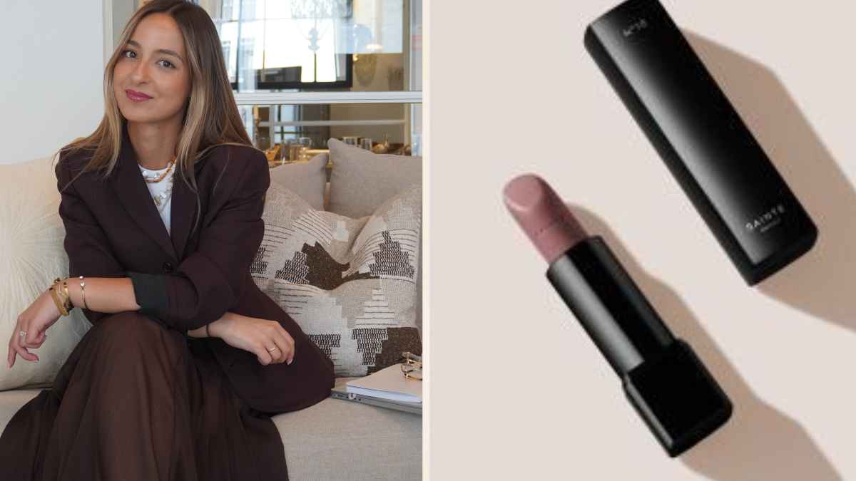 Marina Almohalla, fundadora de MELV, posa con un lápiz labial en un entorno de oficina elegante en Madrid