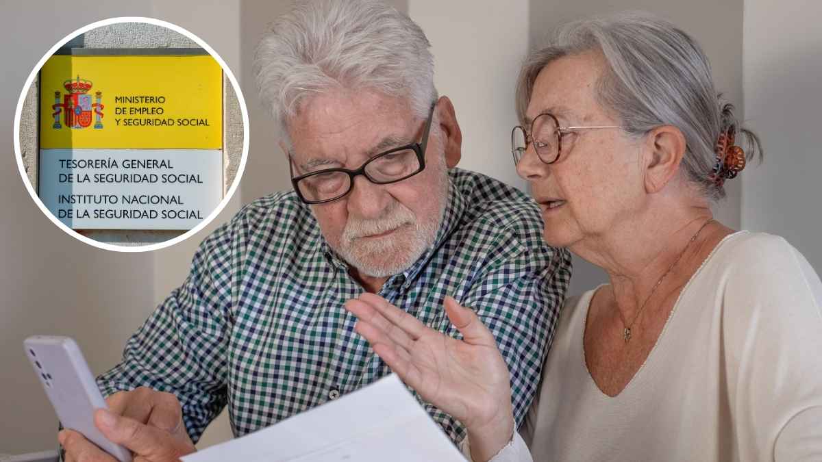 Pareja de jubilados revisando papeles sobre subsidio del SEPE y Seguridad Social
