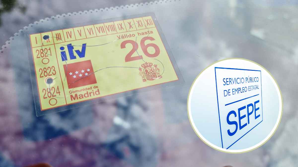 Pegatina de la ITV y logotipo del SEPE sobre un coche en Madrid